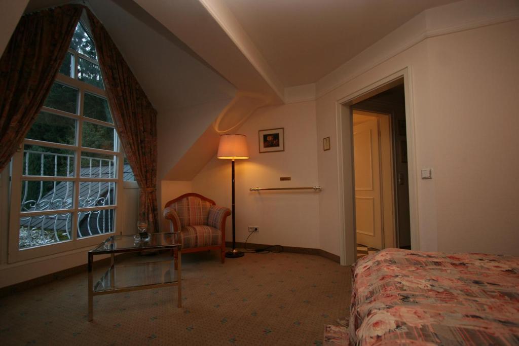 Park Hotel Am Schloss Ettringen  Стая снимка